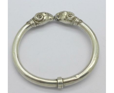 A white metal torque bangle