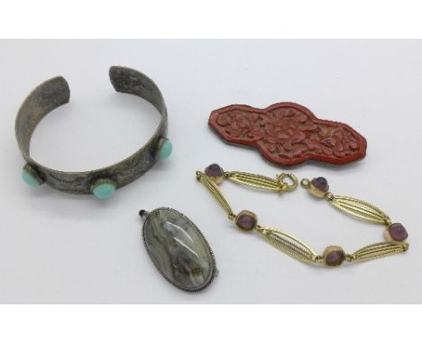 Jewellery including a white metal and turquoise set bangle, a purple stone set bracelet, a silver and moss agate brooch or pe