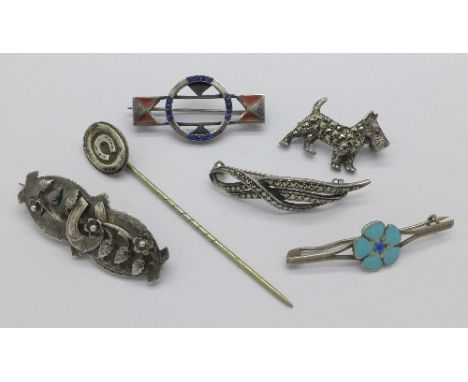 Five silver brooches including one Victorian and a silver stick pin