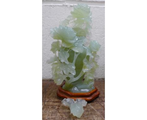 A carved jade lidded pot and stand, a/f