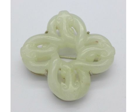 A silver and jade brooch, 48mm