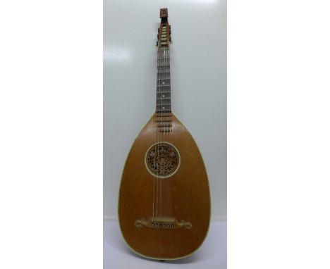 A German lute guitar with scalloped frets and ivoroid stringing, length of back 48cm