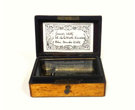 Small Early 20th Century music box with a 7.1cm cylinder playing 3 airs on a single comb, in a rectangular maple case with va