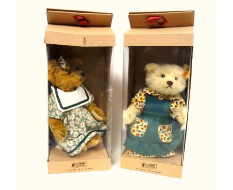 Steiff Classic Teddy bear 23, 028618, dressed in a sunflower decorated dress, and another Classic Bear 23, 028632, both boxed