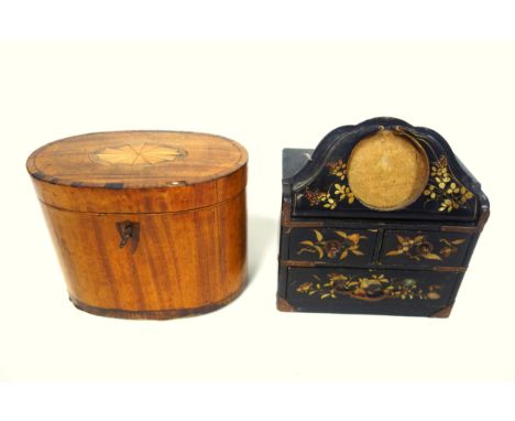 Small Chinese jewellery box with three drawers and lift out pocket watch stand, all in ebonised wood with gilt floral decorat
