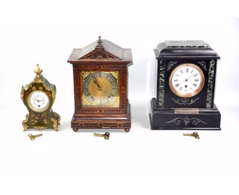 Late 19th Century French presentation mantel timepiece with a circular white enamelled dial enclosing an 8 day movement by J 