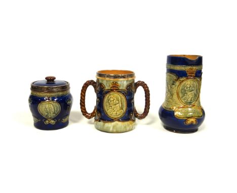 Royal Doulton stoneware commemorative loving cup, the cylindrical body with a silver plated rim, profile portrait of Lord Nel
