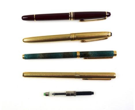 Montblanc Meisterstuck fountain pen with a 14k gold nib marked "4810" and "14k Montblanc", burgundy body and cap with gilt tr