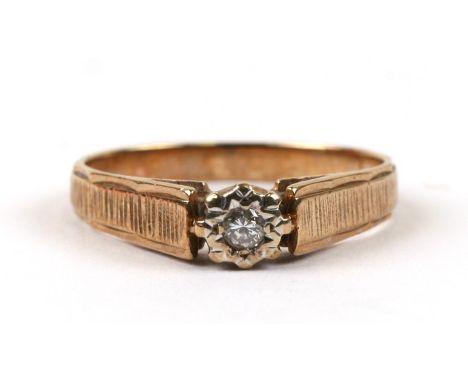A 9ct gold diamond solitaire ring, approx UK size 'M'.