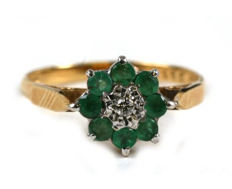 An 18ct gold diamond and emerald cluster ring, approx. UK size 'O'.Condition Reportgood overall condition, hallmarked&nbsp;