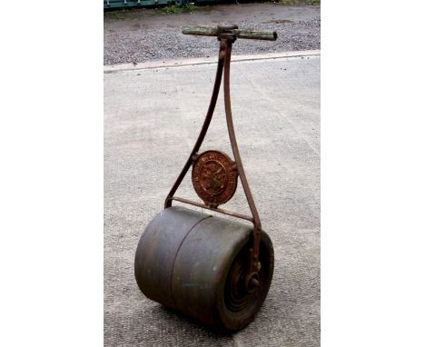 A garden roller with Sherborne maker's plaque.Condition ReportSeized.