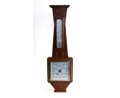 An Art Deco walnut cased barometer thermometer, 57cms (22.5ins) high.