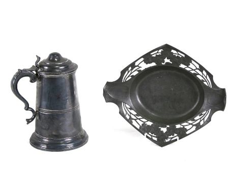 An Art Nouveau Orivit pewter basket, 30cms (12ins) wide; together with a large lidded stein tankard, 23cms (9ins) high (2).