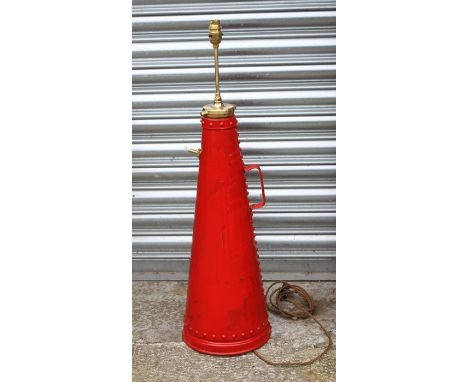 A red painted fire extinguisher of conical form converted to a lamp, 83cms (32.5ins) high.