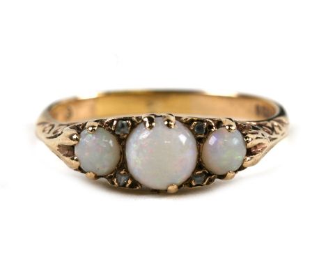 A 9ct gold three-stone opal ring, weight 3.4g, approx UK size 'S'.