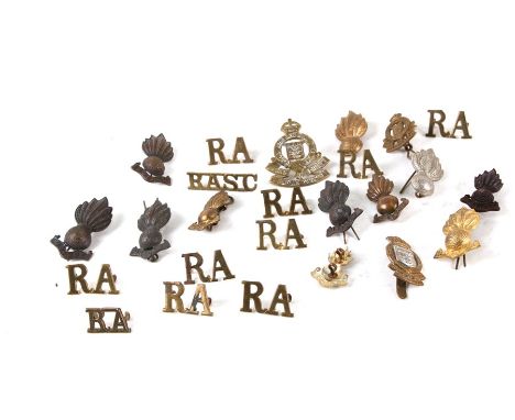 WW1 Army Ordnance Corps badges together with RA (Royal Artillery) shoulder badges and lapel badges