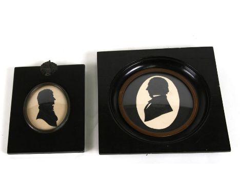 Two portrait miniature silhouettes mounted in ebonised frames, one inscribed to verso.