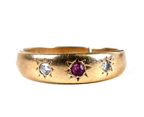 A 9ct gold diamond and ruby gypsy ring approx. UK size Q.  3.8gCondition Reportshank has been cut