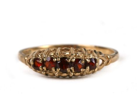 A 9ct gold five-stone garnet ring, approx UK size 'P'.