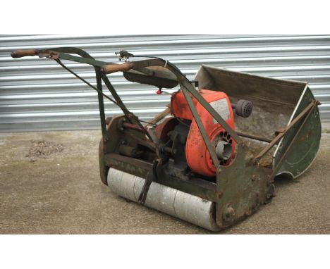 An ATCO self-propelled grounds mans lawnmower with Villiers petrol engine, with 70cms (28ins) cut and grass box.