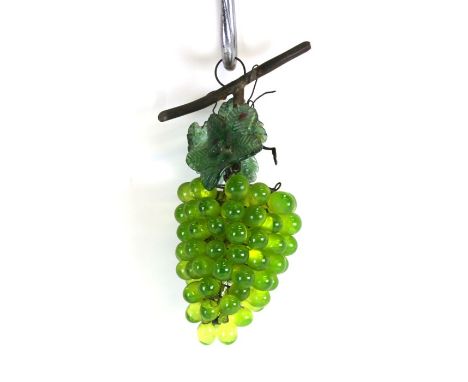 A glass light fitting in the form of a bunch of grapes, possibly Uranium glass, 27cms (10.5ins) high.Condition Reportone grap
