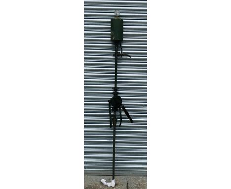 An early 20th century French JAPY hand cranked vintage petrol pump with sight glass and treen handle, 214cms (7ft high).