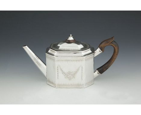 A GEORGE III BRIGHT CUT TEA POT, London 1810, maker's mark of William Vincent, of octagonal form, fitted with timber handle a