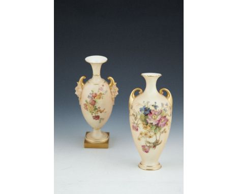 A ROYAL WORCESTER PORCELAIN BLUSH MINIATURE VASE OF CIRCULAR BALUSTER FORM with cast mask handles, painted with floral sprays