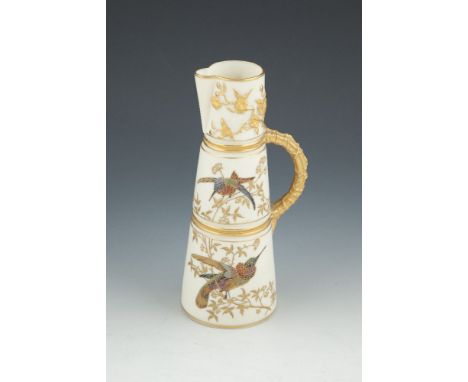 A ROYAL WORCESTER PORCELAIN CLARET JUG, of circular tapering form, the ivory ground decorated with painted  and gilded birds 