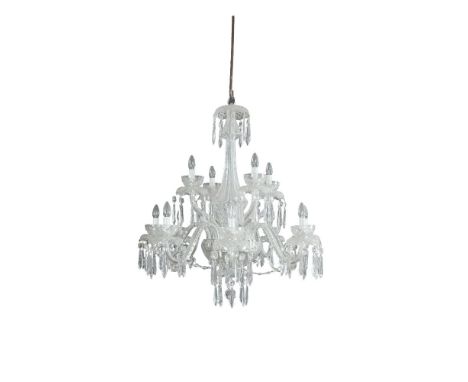 A LARGE WATERFORD CUT GLASS TWELVE BRANCH CHANDELIER, with fluted central column issuing twelve scroll arm branches, arranged