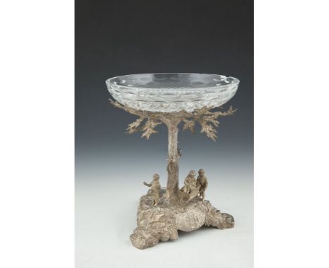 A MODERN SILVER AND CUT GLASS CENTREPIECE, London 1977, surmounted with a Waterford circular bowl supported on a naturalistic