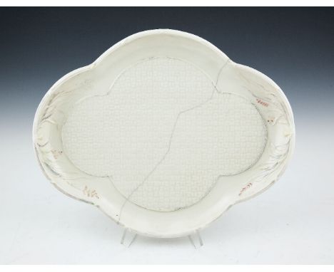 A BELLEEK FIRST PERIOD GRASS PATTERN QUATREFOIL TRAY, the reserve with basket weave pattern, with black stamp, also impressed