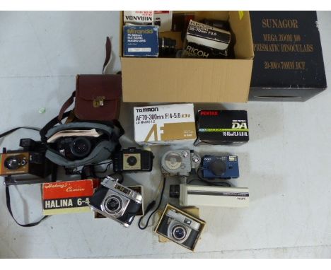Selection of vintage camera's to include Polaroid, Pentax, Revere etc along with a large selection of various lenses and addi
