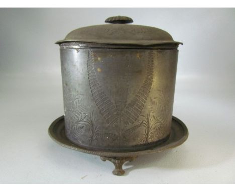 Pewter Tea caddy decorated with fern and foliage.