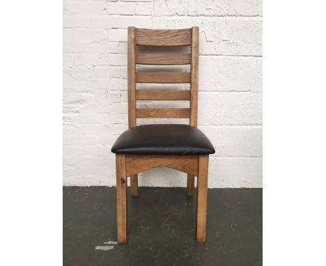 A set of six modern oak high ladder back chair with brown leatherette padded seat