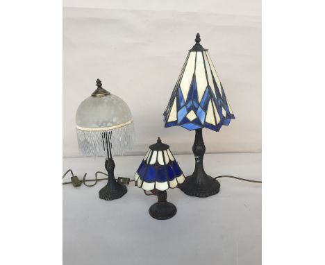 Two Tiffany style table lamps with metal base and geometric shade in white and blue 58cmH and 27cmH together with a white spo