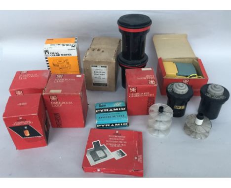 A quantity of developing accessories for a dark room, some boxed to include a Paterson contact printer and safe light, 8mm Py