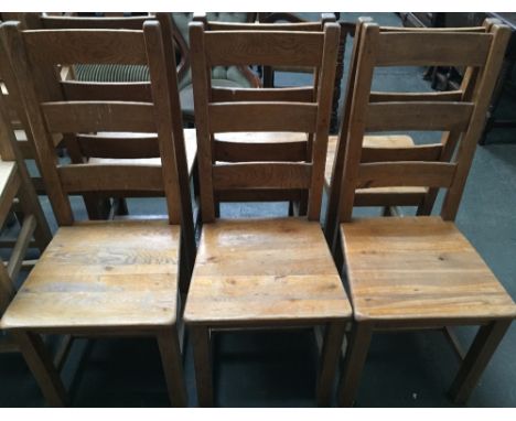Six ladder-back kitchen chairs
