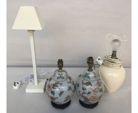 Two table lamps with floral ginger jar ceramic base 30cmH and a large cream ceramic urn shape table lamp 30cmH together with 