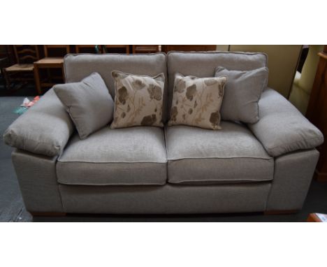 A brand new Dexter double sofa bed upholstered in light marl grey fabric with removable covers and four decorative cushions p