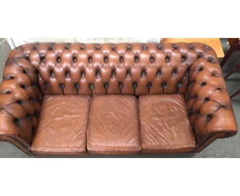 A three seater brown leather button back Chesterfield  sofa made by Moran of Melbourne187cmW