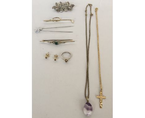 A small set to include an amethyst pendant with chain, a bright cut cross with chain, two hat pins, a tie pin in the form of 