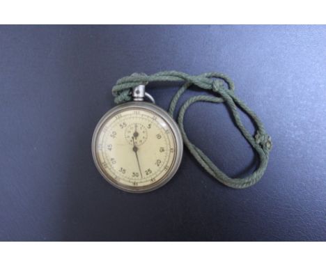 A MILITARY STOPWATCH, with broad arrow to reverse, Dia 4.5 cm Condition Report:ticks but doesn't reset