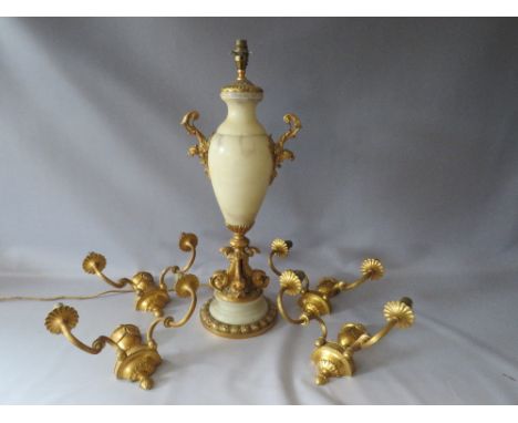 A LARGE MARBLE AND GILT METAL TABLE LAMP,with mythical dolphin overall support, H 68 cm, together with a set of four gilt bra