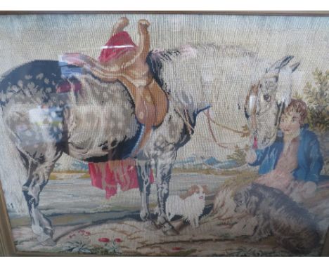 A 19TH CENTURY TAPESTRY OF A RIVER LANDSCAPE, with horse and figure and two dogs resting, mountains beyond, framed and glazed