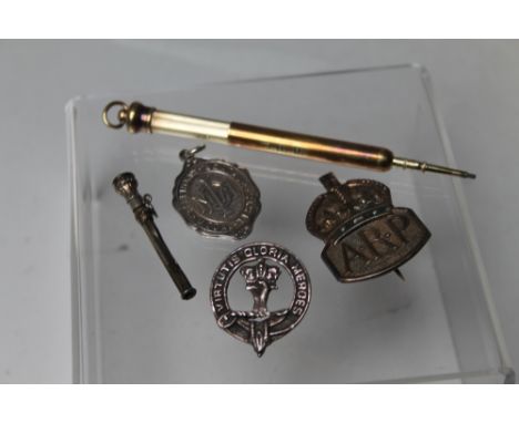 A HALLMARKED SILVER ARP BADGE, together with a hallmarked silver ballroom dancing medal and another silver military badge wit