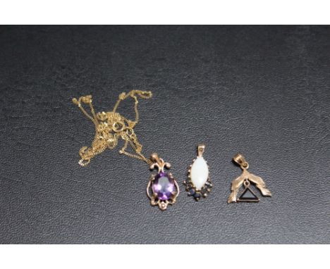 A 9 CARAT GOLD AMETHYST PENDANT, stamped 375 and on a 9ct chain,an opal and sapphire pendant and an unmarked pendant (3)