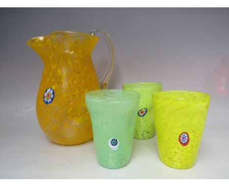 A VENETIAN MURANO GLASS FOUR PIECE LEMONADE SET, comprising a large pitcher and three freeform tumblers, finished in mottled 