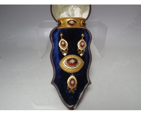 A CASED VICTORIAN YELLOW METAL SEED PEARL AND CABOCHON SET PARURE, comprising brooch, earrings and bangle