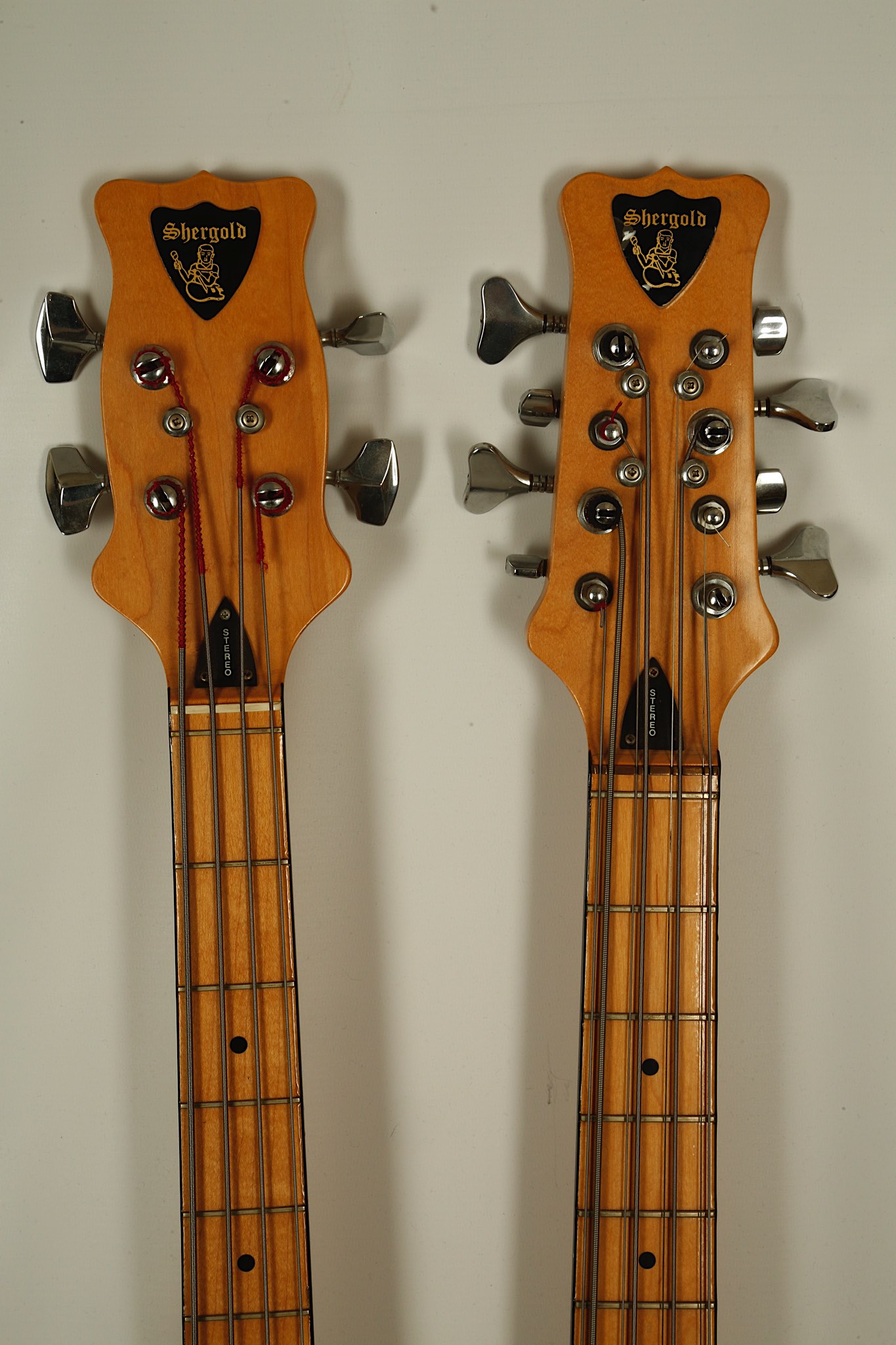 A 1970's Shergold 4/8 String Double Neck Bass Guitar in Black very good condition with case.